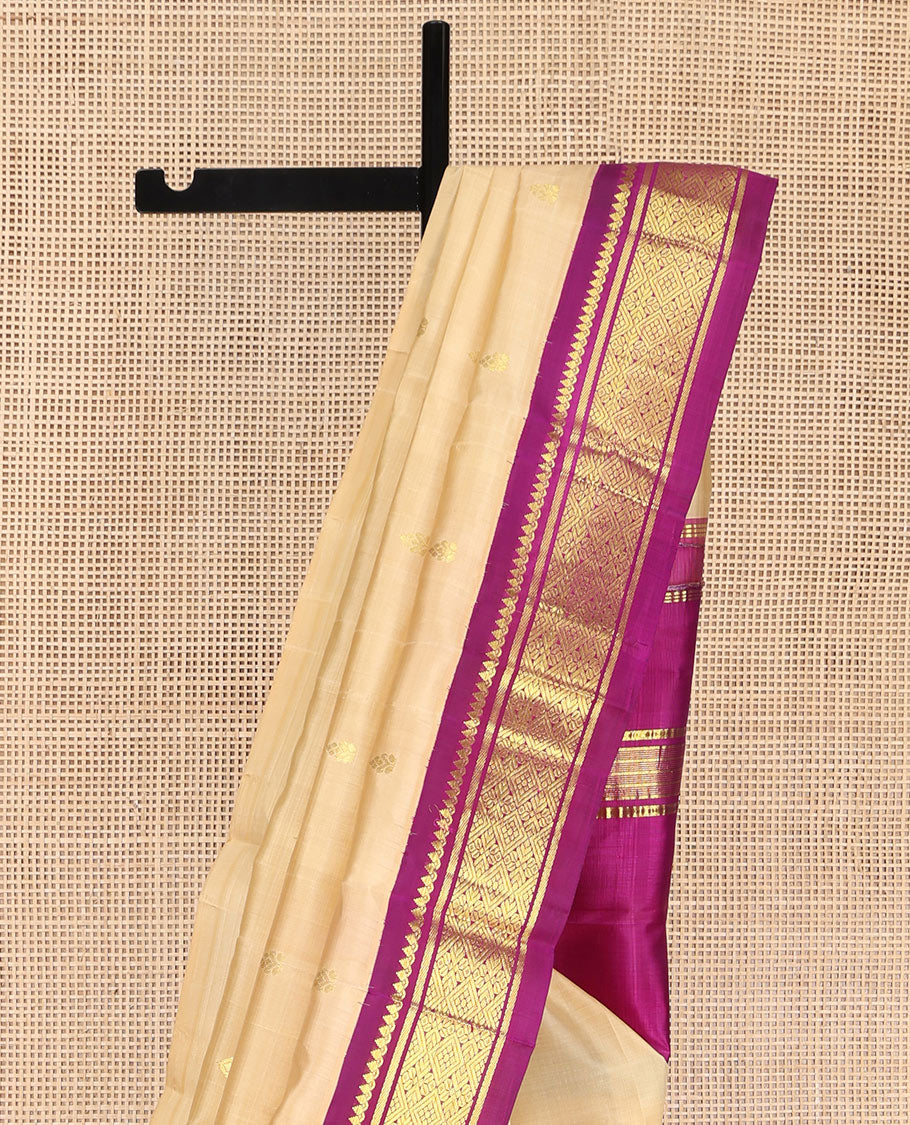 Sandal Kanchipuram Silk Saree, Accentuated with Zari Buttas on Its Body, Complemented by a Contrast One-Sided korvai Border of Thilakam Mokku, Banaras, and Jaal Designs, Pallu Depicts Zari Designs, and Comes Without a Blouse