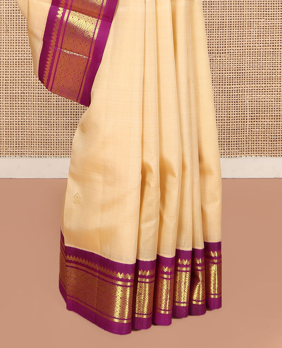 Sandal Kanchipuram Silk Saree, Accentuated with Zari Buttas on Its Body, Complemented by a Contrast One-Sided korvai Border of Thilakam Mokku, Banaras, and Jaal Designs, Pallu Depicts Zari Designs, and Comes Without a Blouse