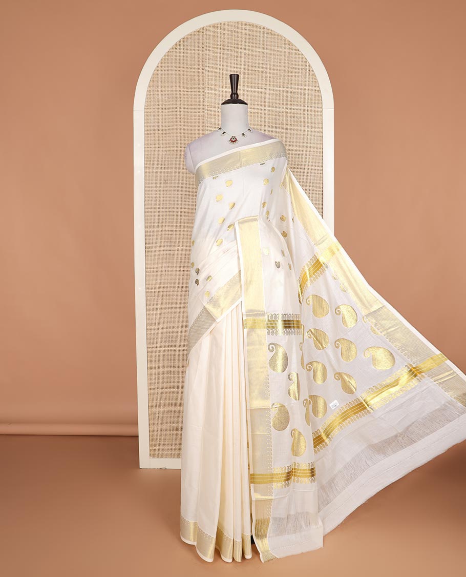 Cream paisley zari buttas Kerala cotton saree, paisley zari border, and zari paisley pallu