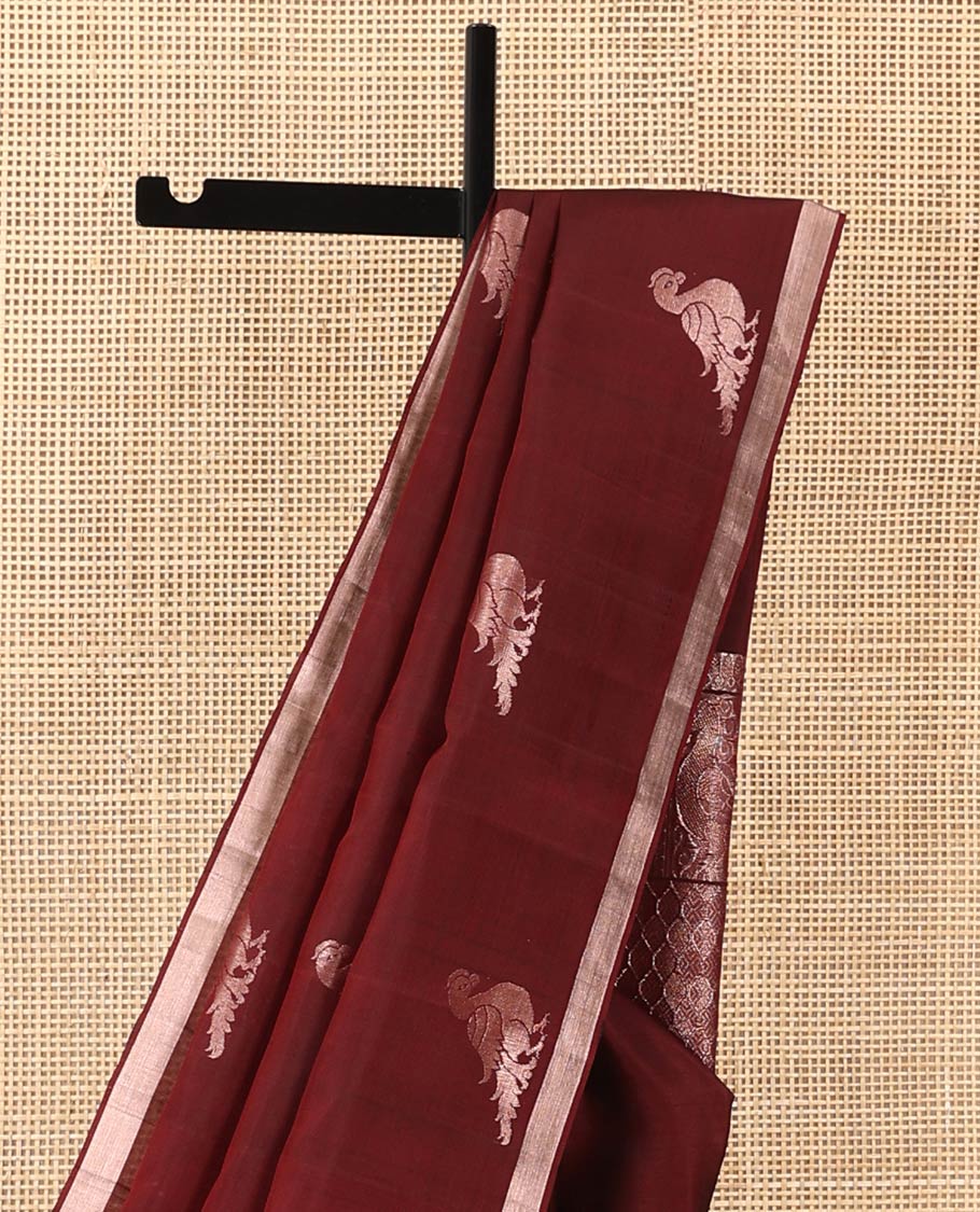Maroon mayil motifs zari woven soft silk saree, zari piping border, and ogee patterned pallu