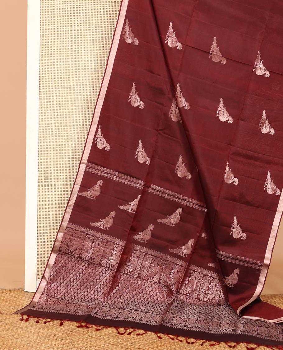 Maroon mayil motifs zari woven soft silk saree, zari piping border, and ogee patterned pallu