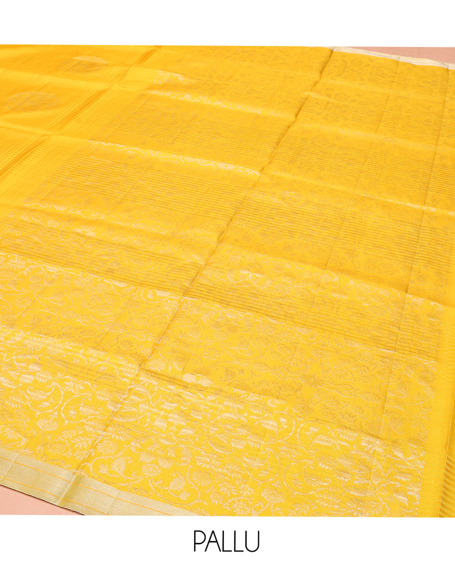 Yellow Mayuri Soft Silk Saree, Bedecked with Stripes and Buttas on Its Body, Subtle Zari Piping Border, Pallu Features Floral Jaal Designs, and Paired with a Matching Blouse