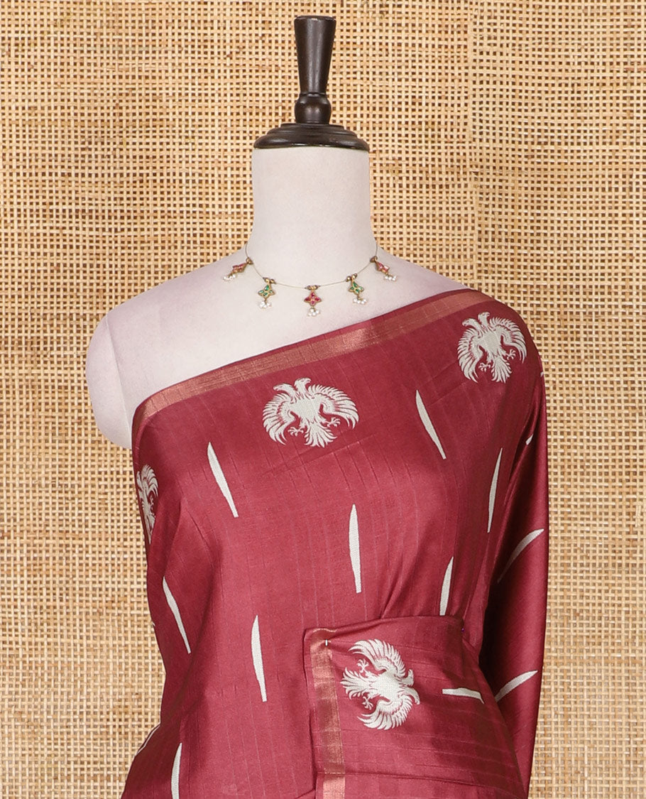 Maroon jasmine bud motifs printed kathan silk saree, double-headed eagle motif zari piping border, pichwai cow printed pallu, and floral printed blouse