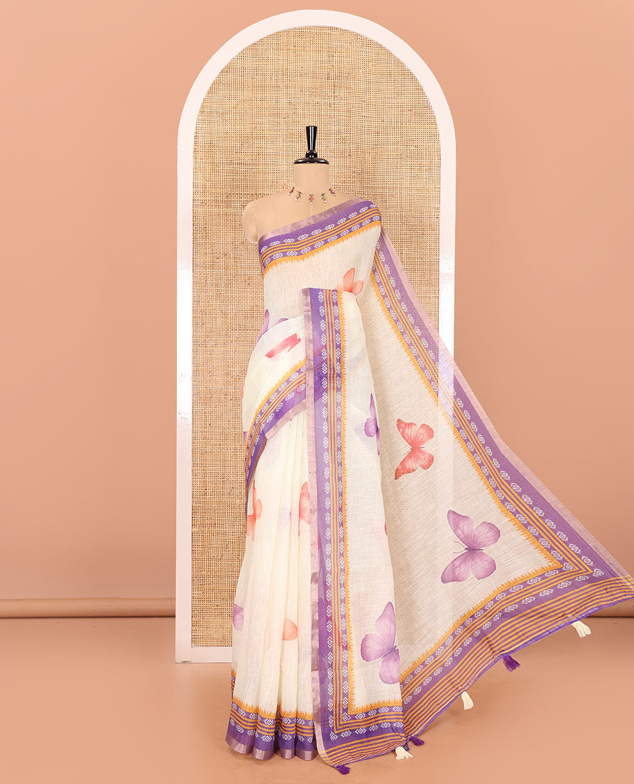 Peach and violet color butterfly motifs printed linen-cotton saree with contrast geometric-printed border and a printed blouse