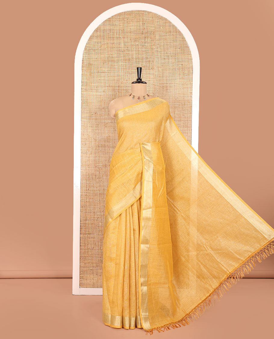 Yellow Tissue Saree, Gleamed Up with Zari Striped on Its Body, Highlighted by a Zari Border, Pallu Steeped with Zari Stripes, and Paired with a Matching Blouse