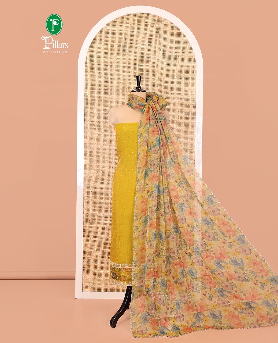 Yellow Moss Organza Material Chudidar Set, Gleamed Up with Stonework Top, a Plain Santoon Bottom, and Paired with Floral Print and Scallop Stonework Dupatta