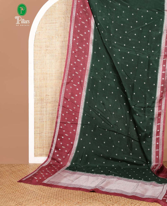 Bottle green zari dola silk saree with banaras border & rich pallu along with plain blouse