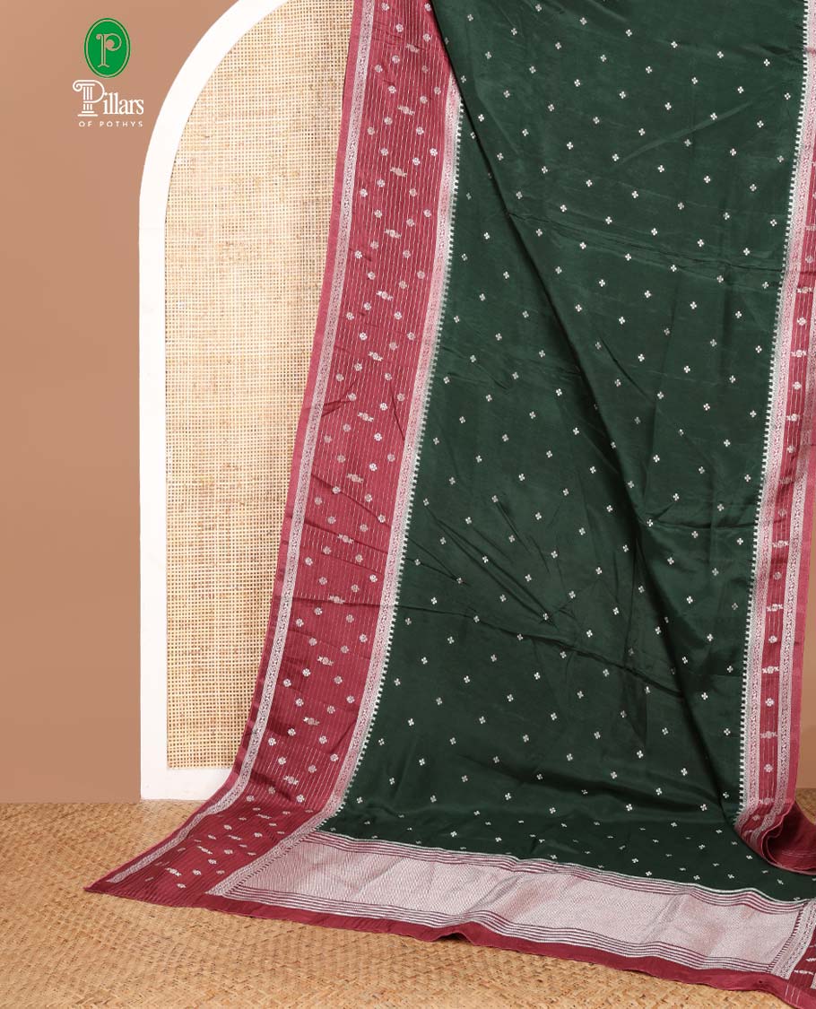 Bottle green zari dola silk saree with banaras border & rich pallu along with plain blouse
