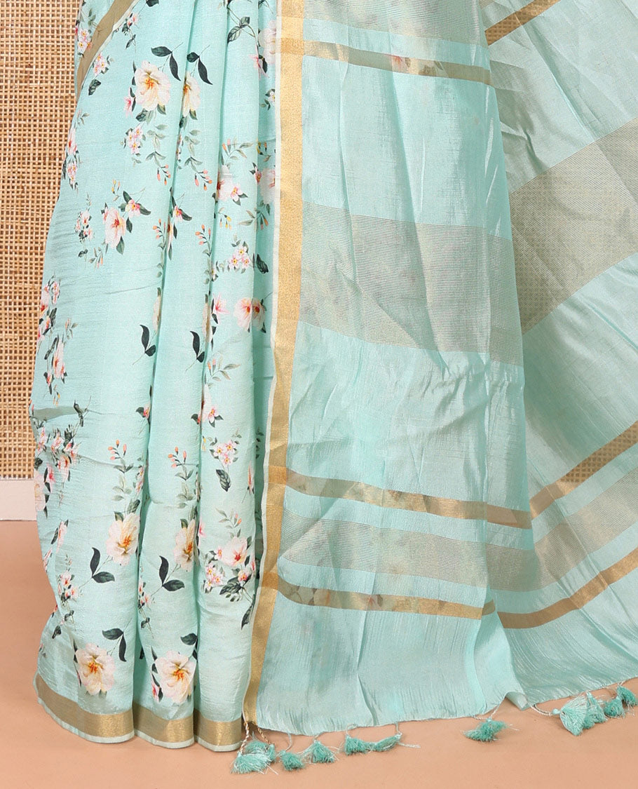 Mint green floral motifs digital printed banana pith saree, piping border, striped pallu, and floral printed blouse