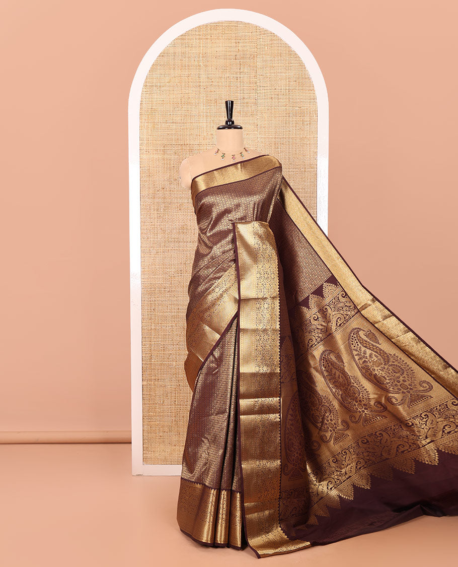 Coffee Brown Kanchipuram Budget Silk Saree Richly Detailed with Jacquard Design, Highlighted by Zari Border of Floral and Jaal Designs, Pallu Embellished with Big Paisley Designs, and Paired with a Matching Blouse