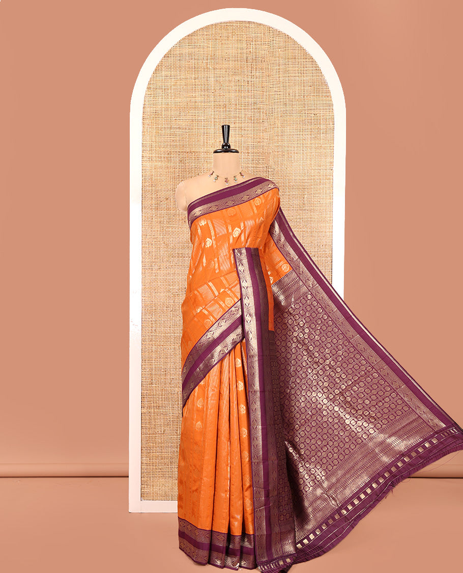 Orange Litchi Saree, Detailed with Vaira Oosi Stripes and Zari Buttas on Its Body, Complemented by a Contrast Rettai Pettu Traditional Zari Design Border, an Intricately Designed Pallu, and Paired with a Contrast Blouse