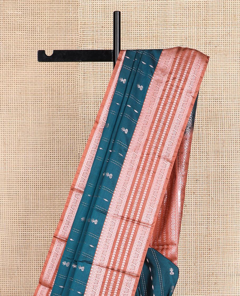 Peacock blue zari designs silk saree, contrast traditional zari border, and floral design pallu