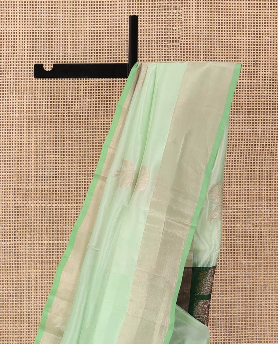Pista green zari buttas Uppada saree, bavanji border, and contrast paisley design pallu