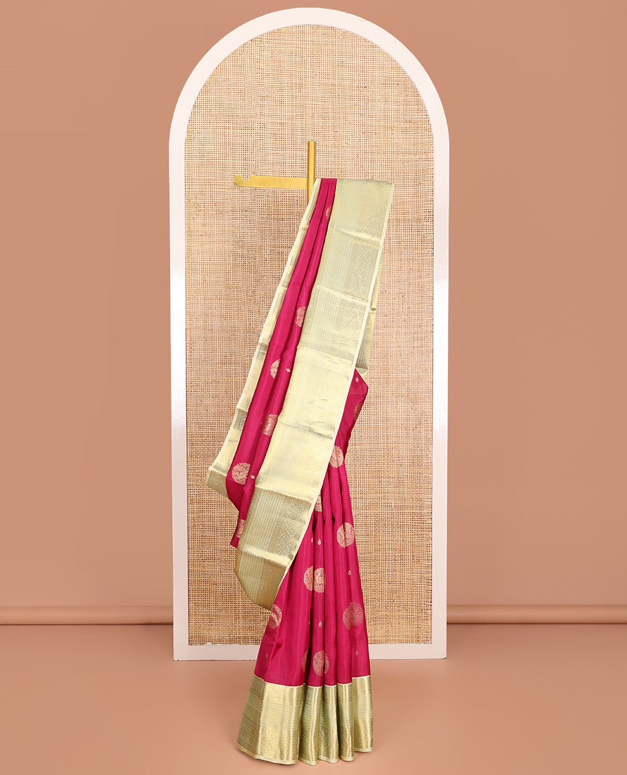 Pink Vasundhara Lite-Silk Mix Saree, Accentuated with Round Mayil Buttas, Complemented by a Contrast Border of Thilakam, Paisa, Lavangam, Kathir, Banaras, Muthu, and Laddu Kamalam Designs, Grand Pallu of Jaal Design, and Paired with a Contrast Blouse