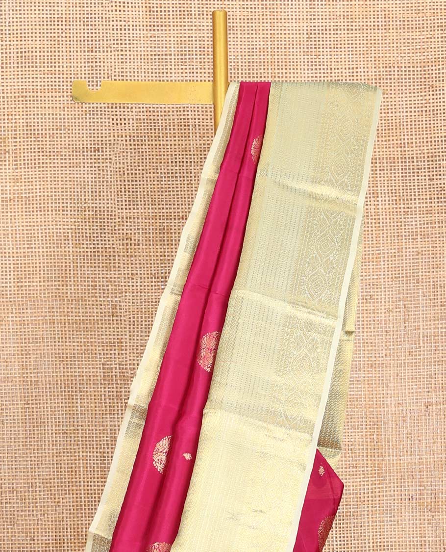 Pink Vasundhara Lite-Silk Mix Saree, Accentuated with Round Mayil Buttas, Complemented by a Contrast Border of Thilakam, Paisa, Lavangam, Kathir, Banaras, Muthu, and Laddu Kamalam Designs, Grand Pallu of Jaal Design, and Paired with a Contrast Blouse