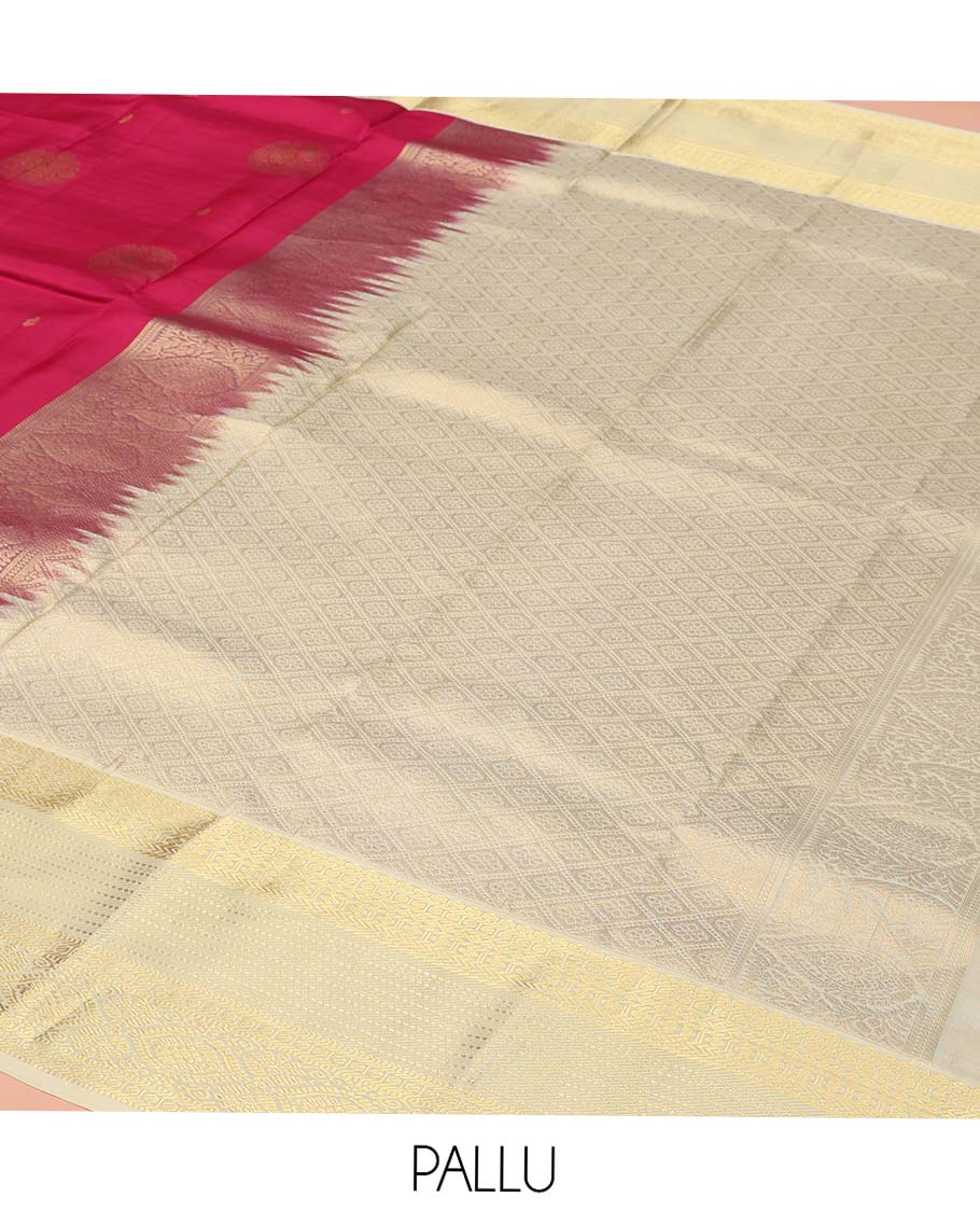 Pink Vasundhara Lite-Silk Mix Saree, Accentuated with Round Mayil Buttas, Complemented by a Contrast Border of Thilakam, Paisa, Lavangam, Kathir, Banaras, Muthu, and Laddu Kamalam Designs, Grand Pallu of Jaal Design, and Paired with a Contrast Blouse