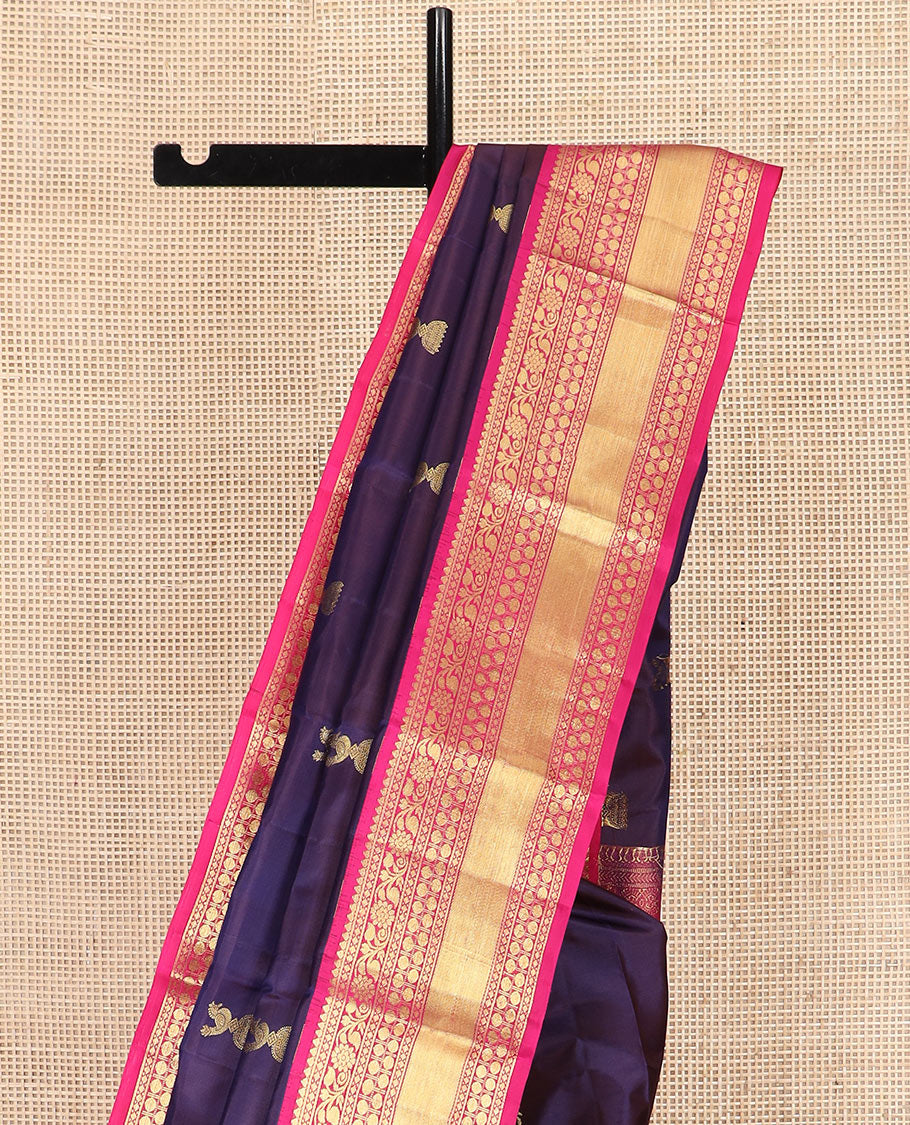Navy Blue Vasundhara Silk Saree Adorned with Zari Buttas, Complemented by a Contrast Border of Thilakam, Diamond, Kodi Visiry, and Rudraksham Designs, Delicately Woven Pallu of Ara Maadam Designs, and a Contrast Blouse