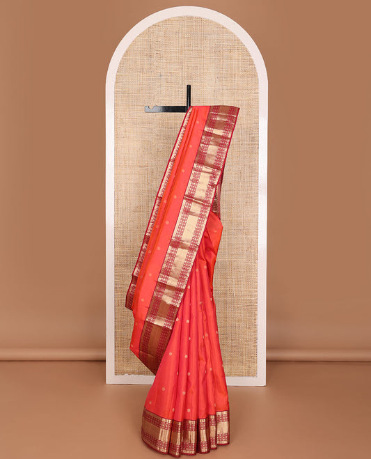 Red zari buttas silk saree, contrast jaal pallu & border of cross kamalam,puli nagam,poun,chakra & then kuli kann