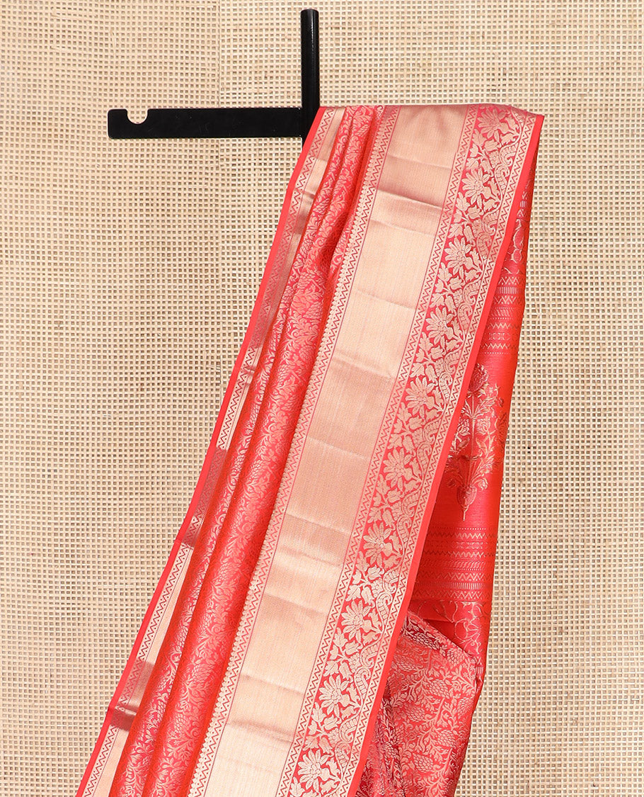Red Kanchipuram Silk Saree Majestically Detailed with Floral Jacquard Design, Highlighted with Zari Border of Thilakam, Neli, and Floral Designs, Impeccably Designed Pallu of Floral-Geometric Designs, and Paired with a Matching Blouse