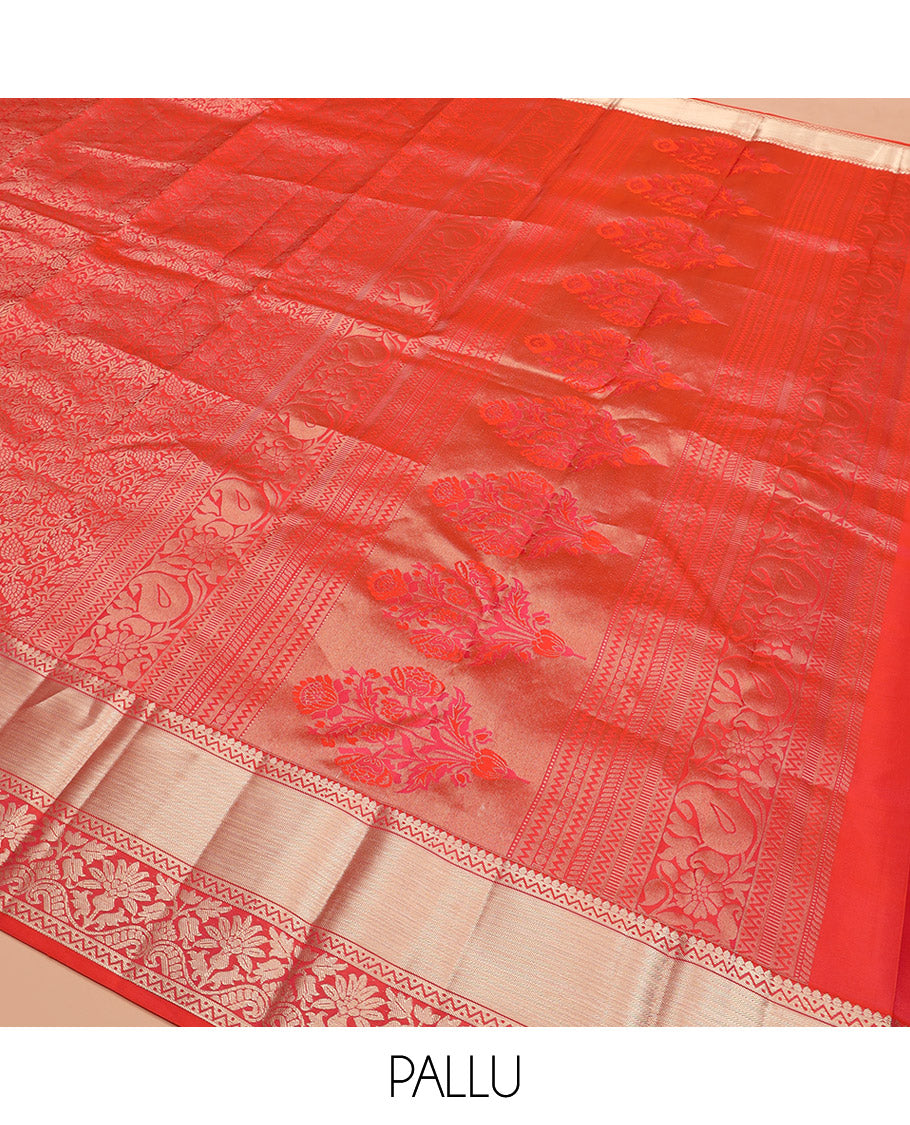 Red Kanchipuram Silk Saree Majestically Detailed with Floral Jacquard Design, Highlighted with Zari Border of Thilakam, Neli, and Floral Designs, Impeccably Designed Pallu of Floral-Geometric Designs, and Paired with a Matching Blouse