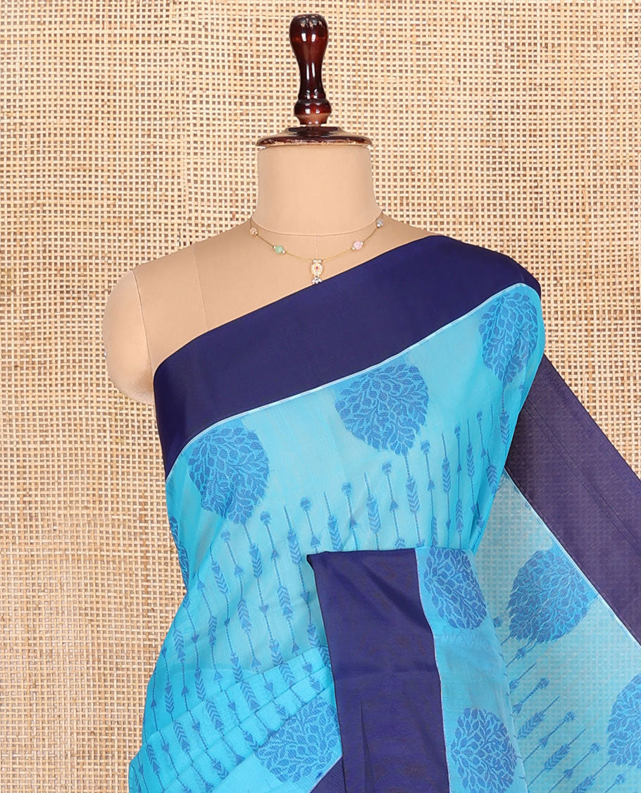 Blue Semi-Silk Cotton Saree, Subtly Sparkled with Stripes All Over Its Body, Complemented by Contrast Border, Pallu Steeped with Pine Tree Motifs, and Paired with a Matching Blouse