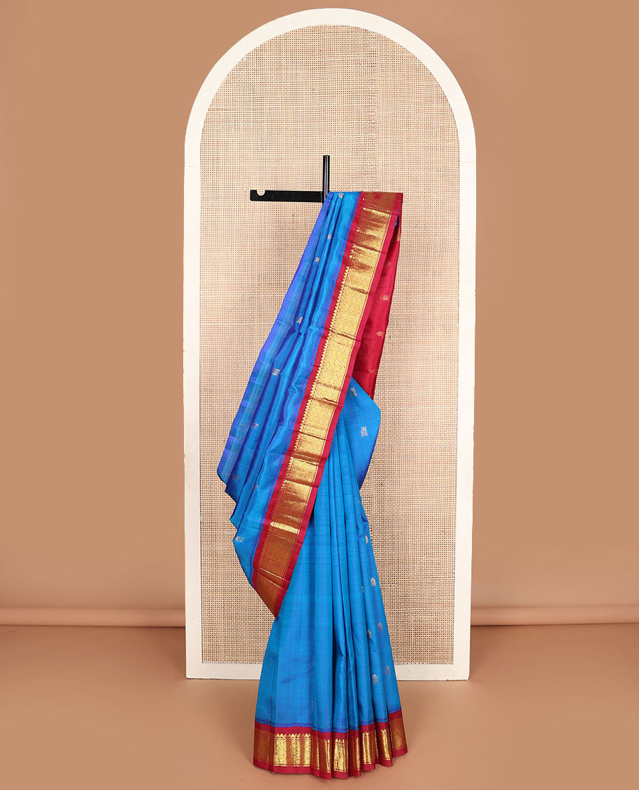 Blue zari buttas Kanchipuram silksaree, contrast one-sided korvai border of thilakam mokku & jaal design & zari design pallu