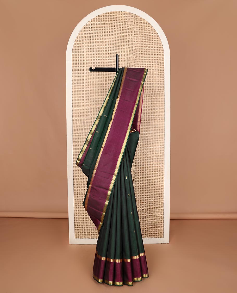 Green zari buttas Kanchipuram silk saree, contrast rettai pettu border of muthu designs, and pallu of muthu designs