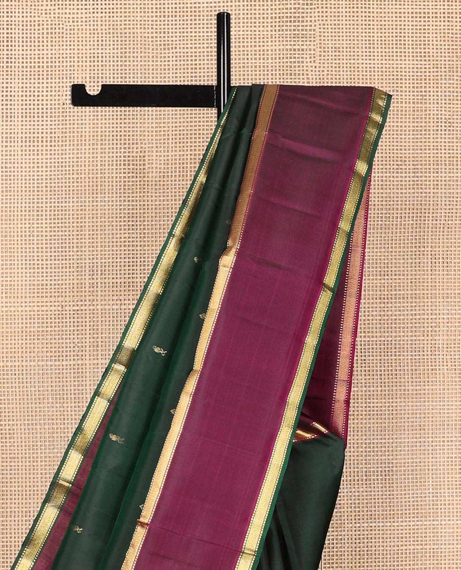 Green zari buttas Kanchipuram silk saree, contrast rettai pettu border of muthu designs, and pallu of muthu designs