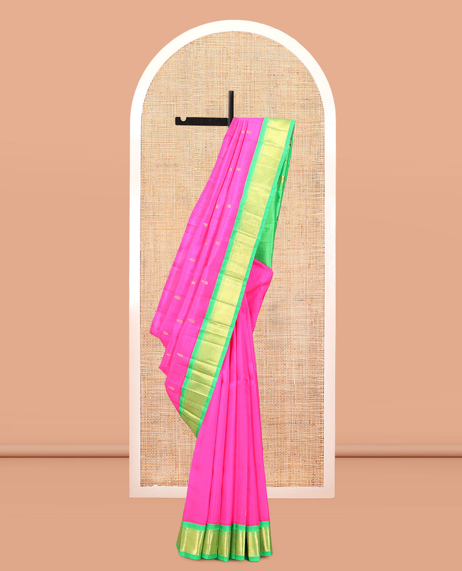 Rani Pink Kanchipuram Silk Saree, Adorned with Zari Buttas, Complemented by a Contrast Korvai Border of Panner Sombu, and Jaal Design, Zari Design Pallu, and No Blouse