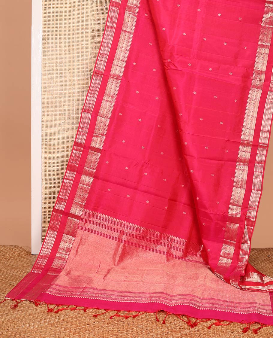 Red zari buttas soft silk saree, rettai pettu border and pallu adorned with traditional zari designs