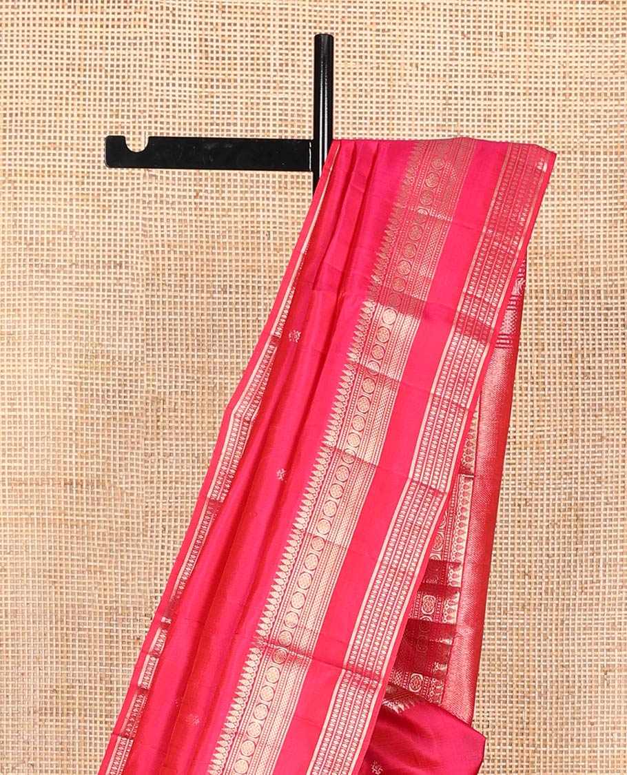 Red zari buttas soft silk saree, rettai pettu border and pallu adorned with traditional zari designs
