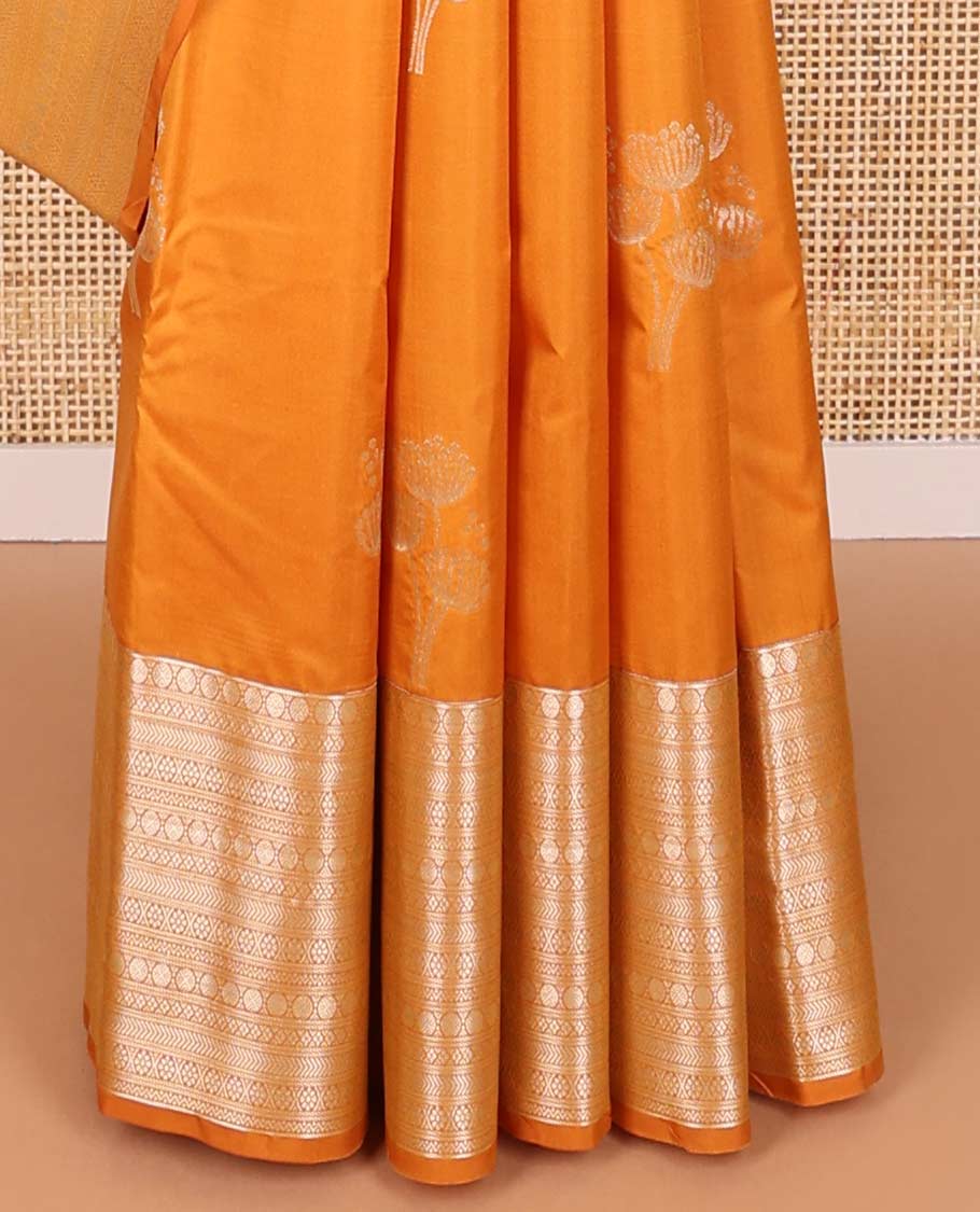 Orange floral design vasundhara elite silk saree with self border of intricate zari design & floral jaal design pallu