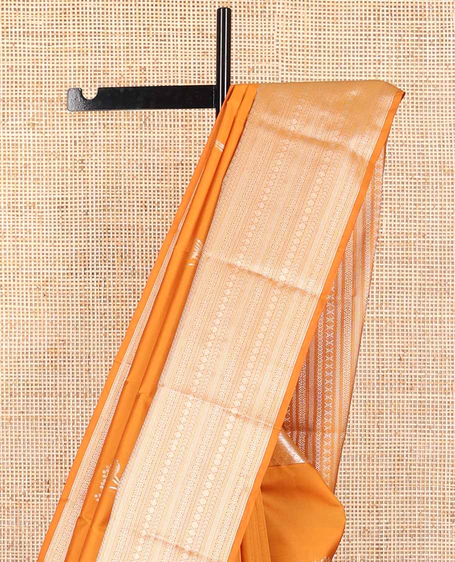 Orange floral design vasundhara elite silk saree with self border of intricate zari design & floral jaal design pallu