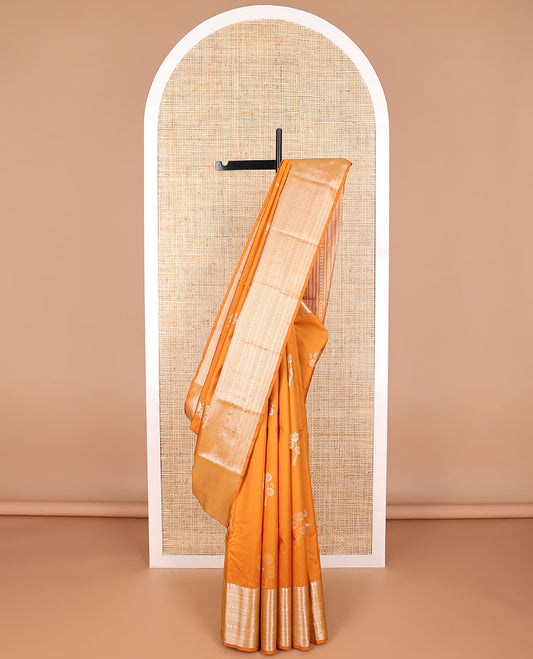 Orange floral design vasundhara elite silk saree with self border of intricate zari design & floral jaal design pallu