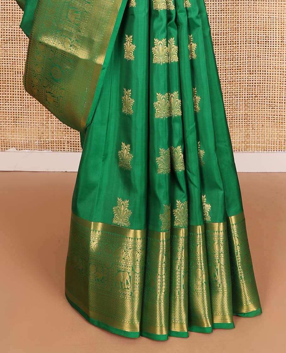 Green zari buttas Vasundhara silk mix saree, zari border of thilakam,diamond,manga, mayil chakram,yaanai, and mayil kann, and jaal pallu