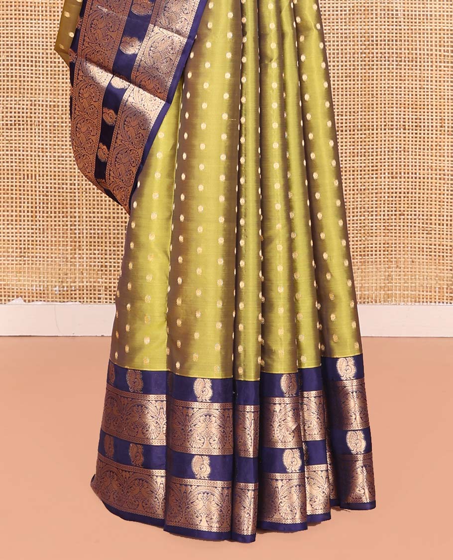 Green Vasundhara Lite Silk Mix Saree, Prettified with Zari Buttas All Over Its Body, Complemented by a Contrast Border Steeped with Mayil Designs, Pallu Steeped with Mayil Designs, and Paired with a Contrast Blouse