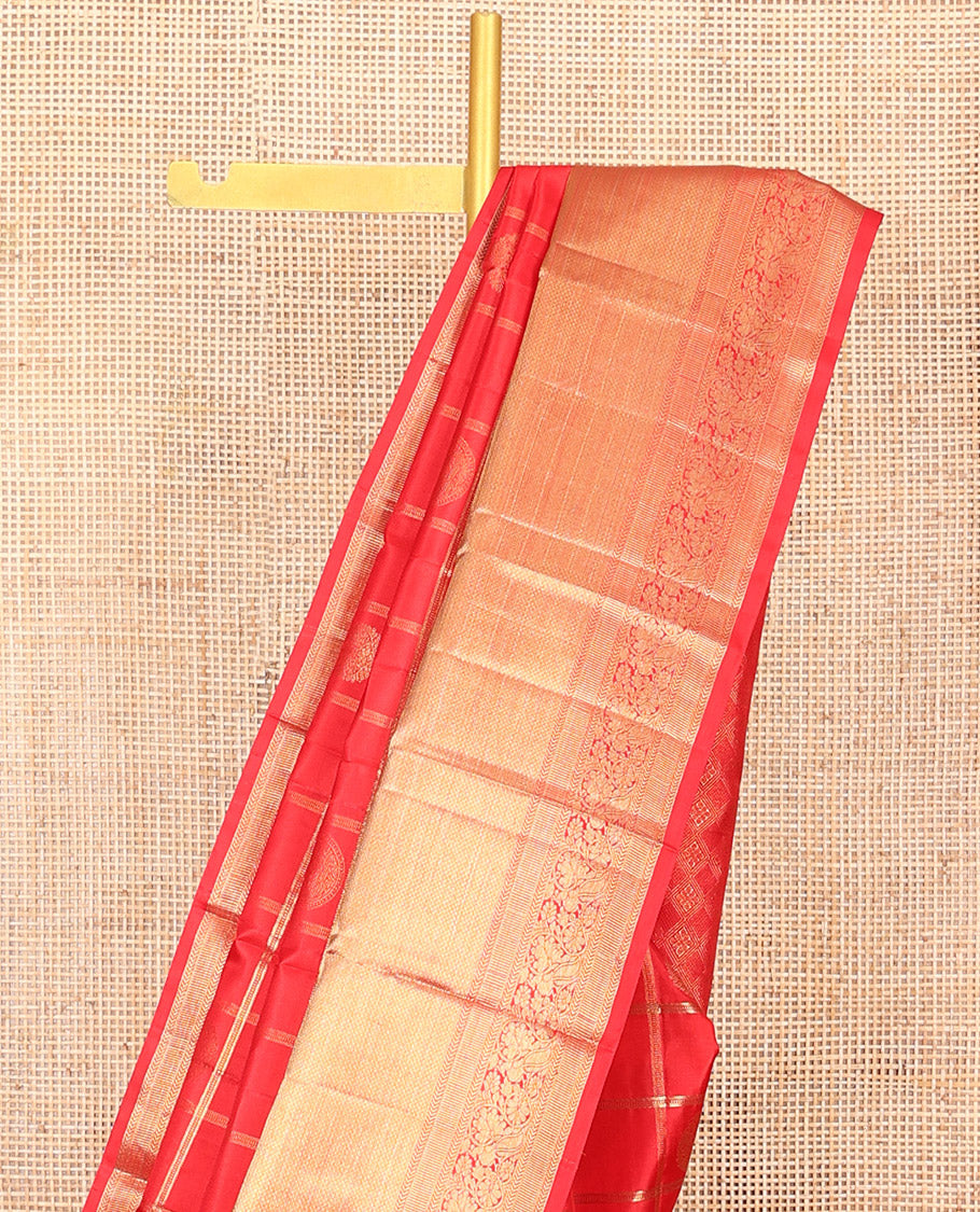 Red Vasundhara Silk Saree Artfully Woven with Zari Butta Enclosed Checks All Over Its Body, Highlighted by Zari Border of Rekku, Mayil Kann, Kathir, and Mayil Designs, a Grand Pallu of Jaal Designs, and Paired with a Matching Blouse