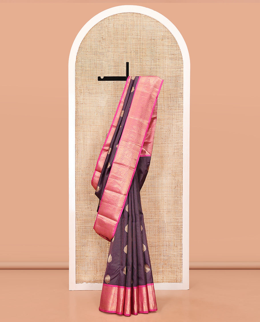 Purple Vasundhara Silk Saree, Detailed with Zari Buttas and Stripes All Over Its Body, Complemented by a Contrast Border of Rekku, Muthu, Poun, Chakram, and Mayil Designs, Grand Manga Design Pallu, and Paired with a Contrast Blouse