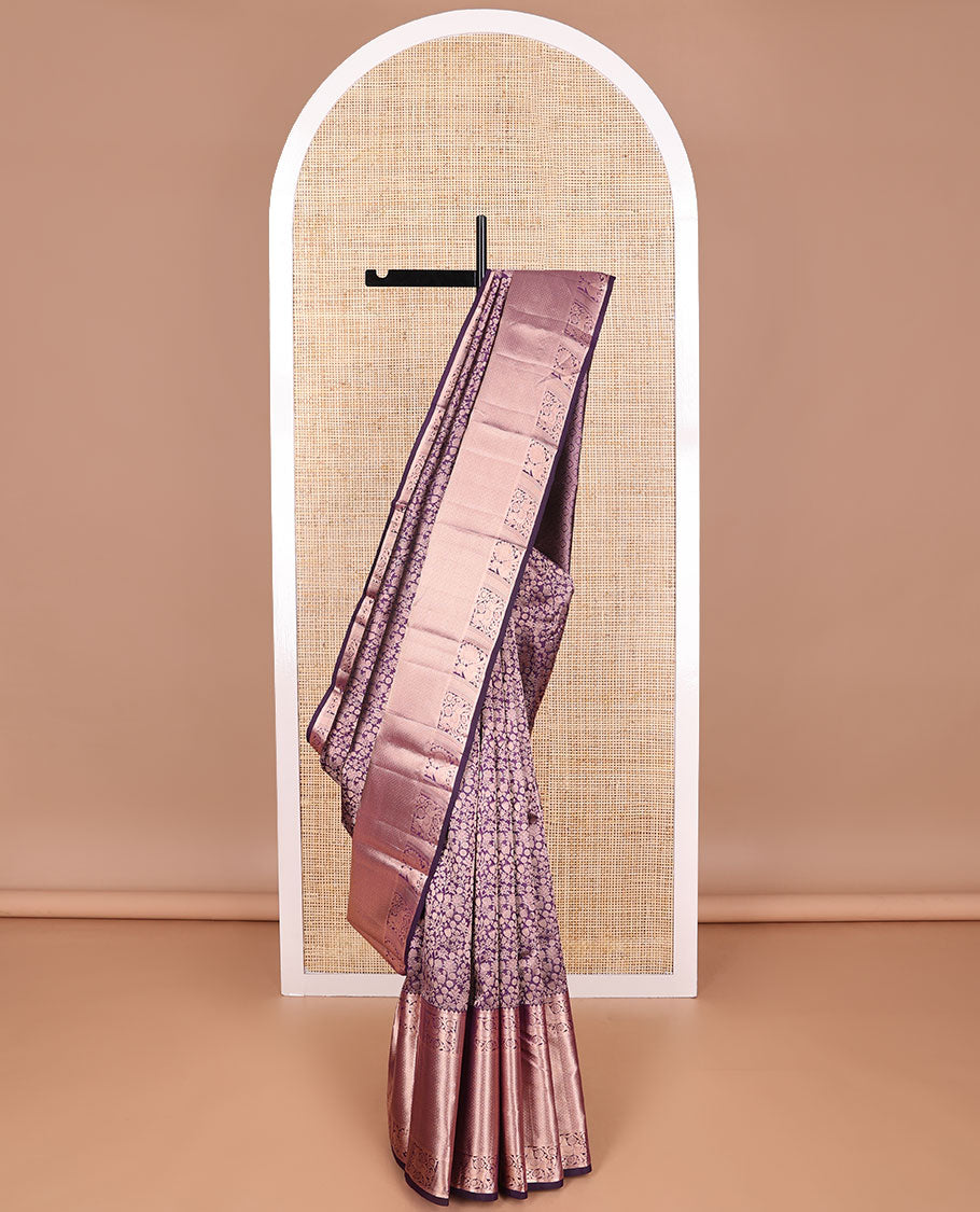 Violet floral jacquard kancheepuram silk saree with self border of mayil kann design & intricate zari design pallu