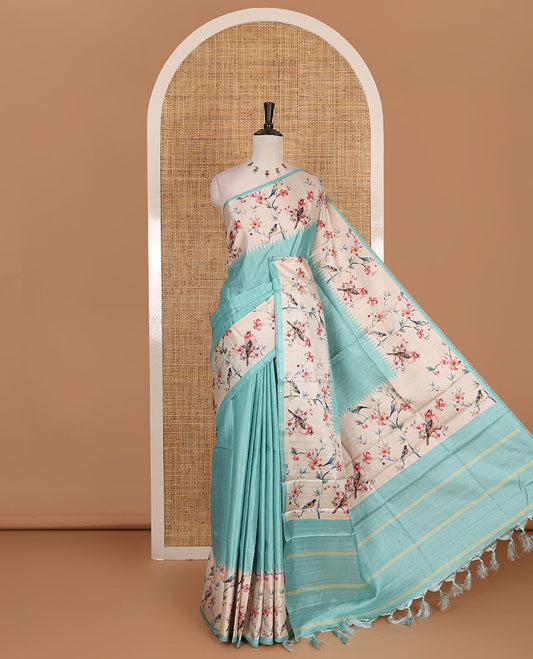 Sea green gold zari dotted buttas semi tussar saree, contrast temple border of floral vine, and sparrow motifs digital print, striped pallu, and printed blouse