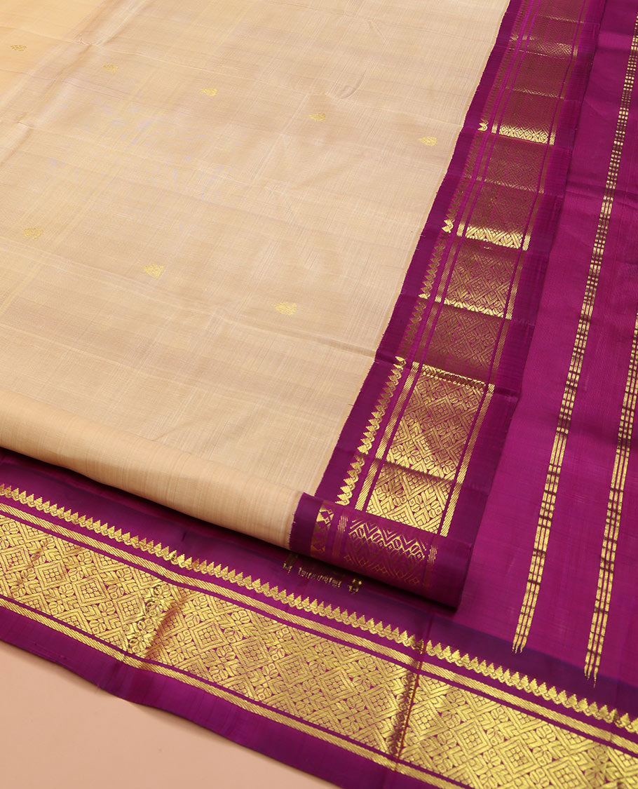 Sandal Kanchipuram Silk Saree, Accentuated with Zari Buttas on Its Body, Complemented by a Contrast One-Sided korvai Border of Thilakam Mokku, Banaras, and Jaal Designs, Pallu Depicts Zari Designs, and Comes Without a Blouse