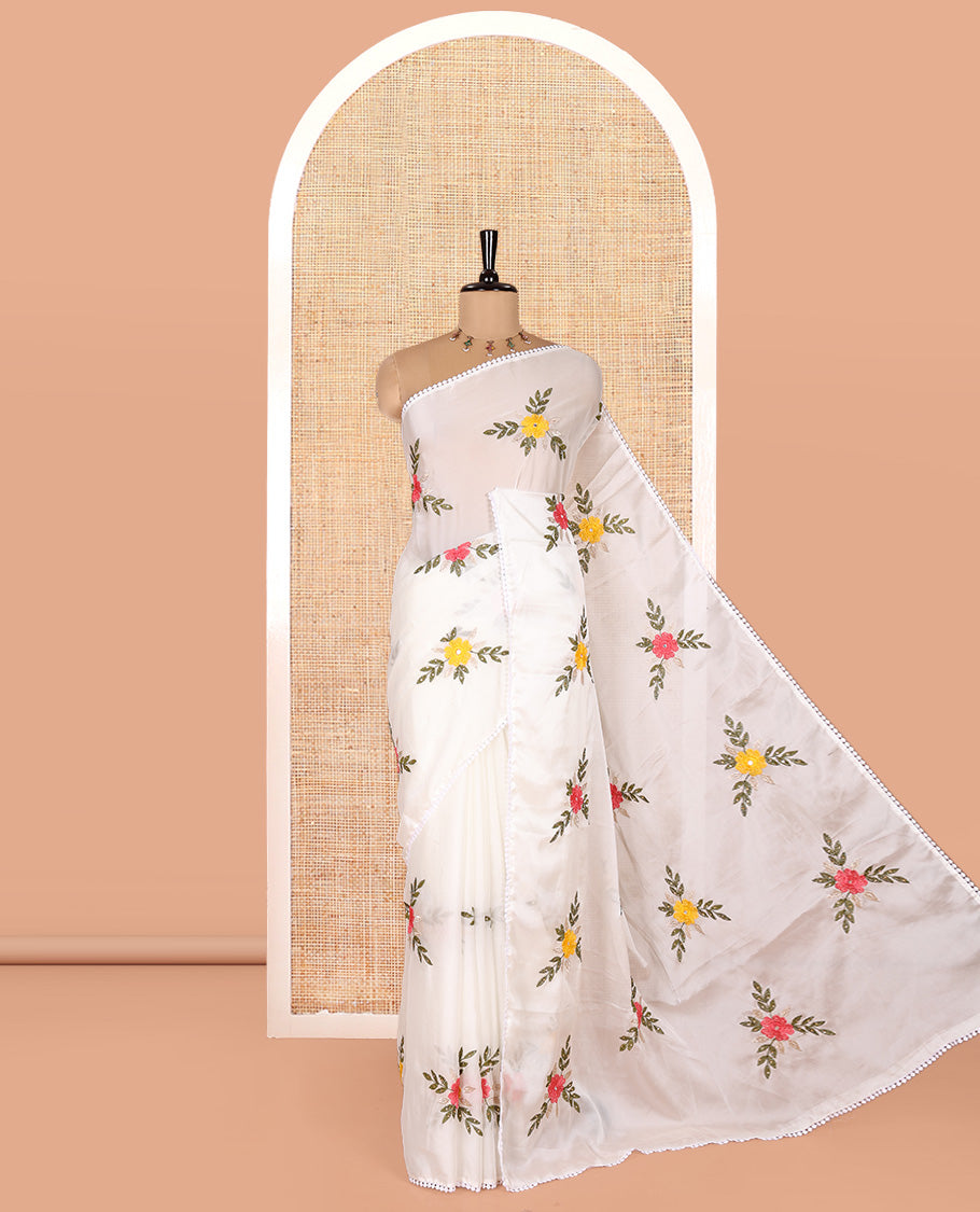 White Rangoli Chiffon Saree, Artfully Embroidered with Floral Motifs in Thread and Stone Work On Its Body, Subtly Sparkled with Lace Border, a Self-Pallu, and Paired with a Contrast Floral Embroidered Blouse