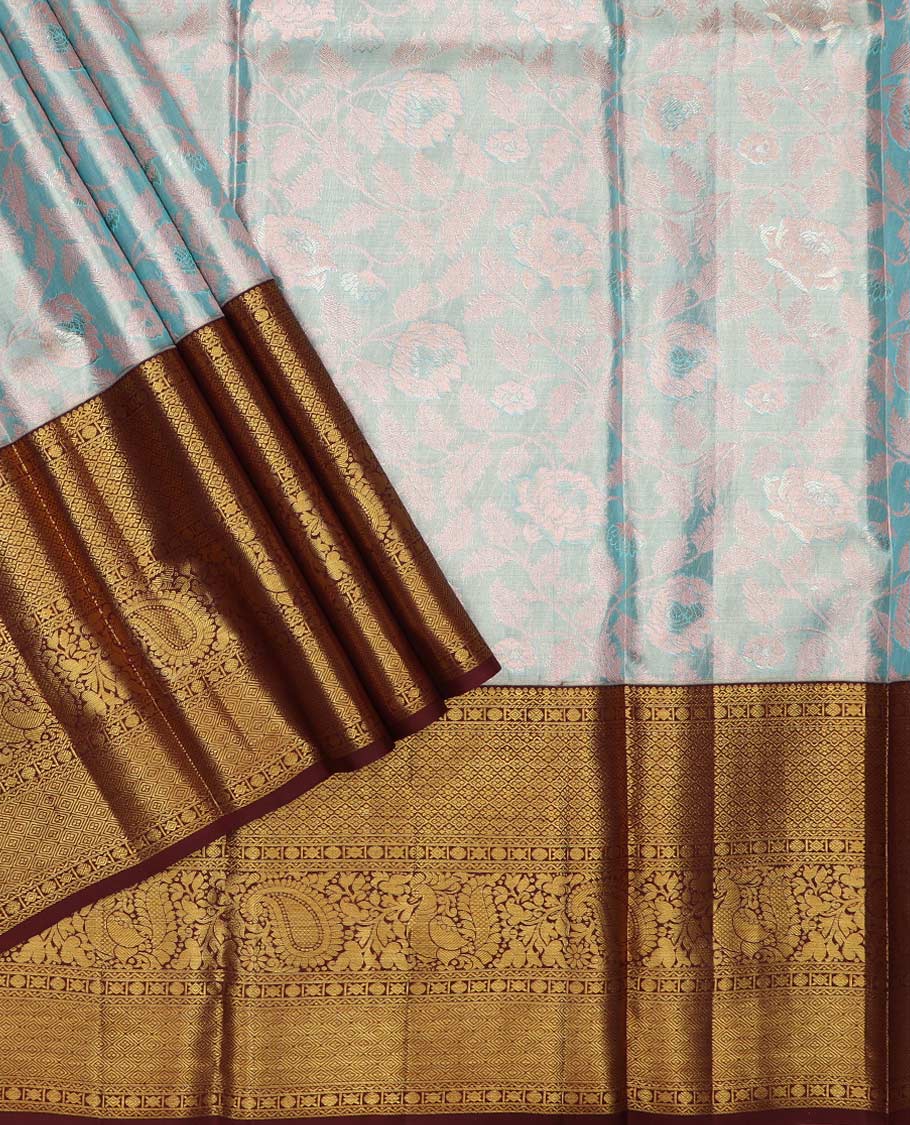 Blue puresilk halfsaree, floral jaal jacquard skirt, contrast blouse, and border of salngai,neli,poun,jaal,manga and jaal, and dhavani of embossed with zari weave