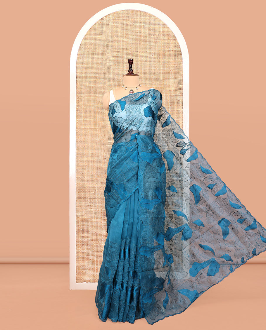 Blue Organza Saree, Steeped in the Prettiness of Floral Thread Embroidery, a Scalloped Embroidery Border, and a Matching Embroidered Blouse