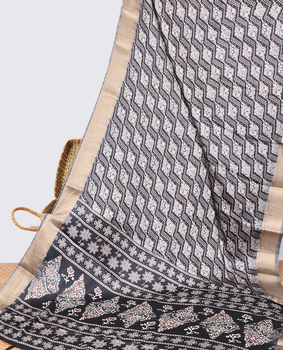 Black argyle design semi-banaras printed saree with contrast zari border & floral motifs pallu