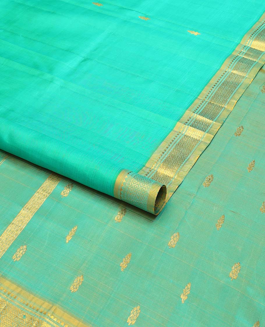 Sea blue buttas kancheepuram silk saree with contrast intricate zari design border & floral zari design pallu
