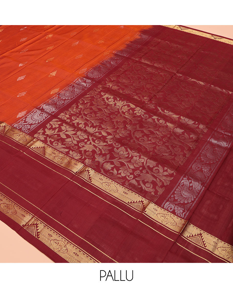 Orange Uppada Silk Saree, Mesmerized with Zari Buttas All Over Its Body, Complemented by a Contrast Traditional Border of Diamond Designs, Pallu Woven with Floral Jaal Designs, and Paired with a Contrast Blouse