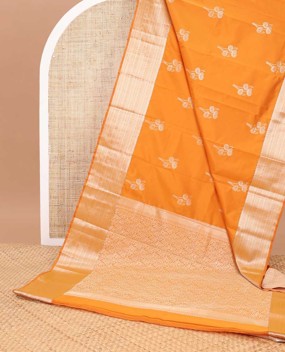 Orange floral design vasundhara elite silk saree with self border of intricate zari design & floral jaal design pallu