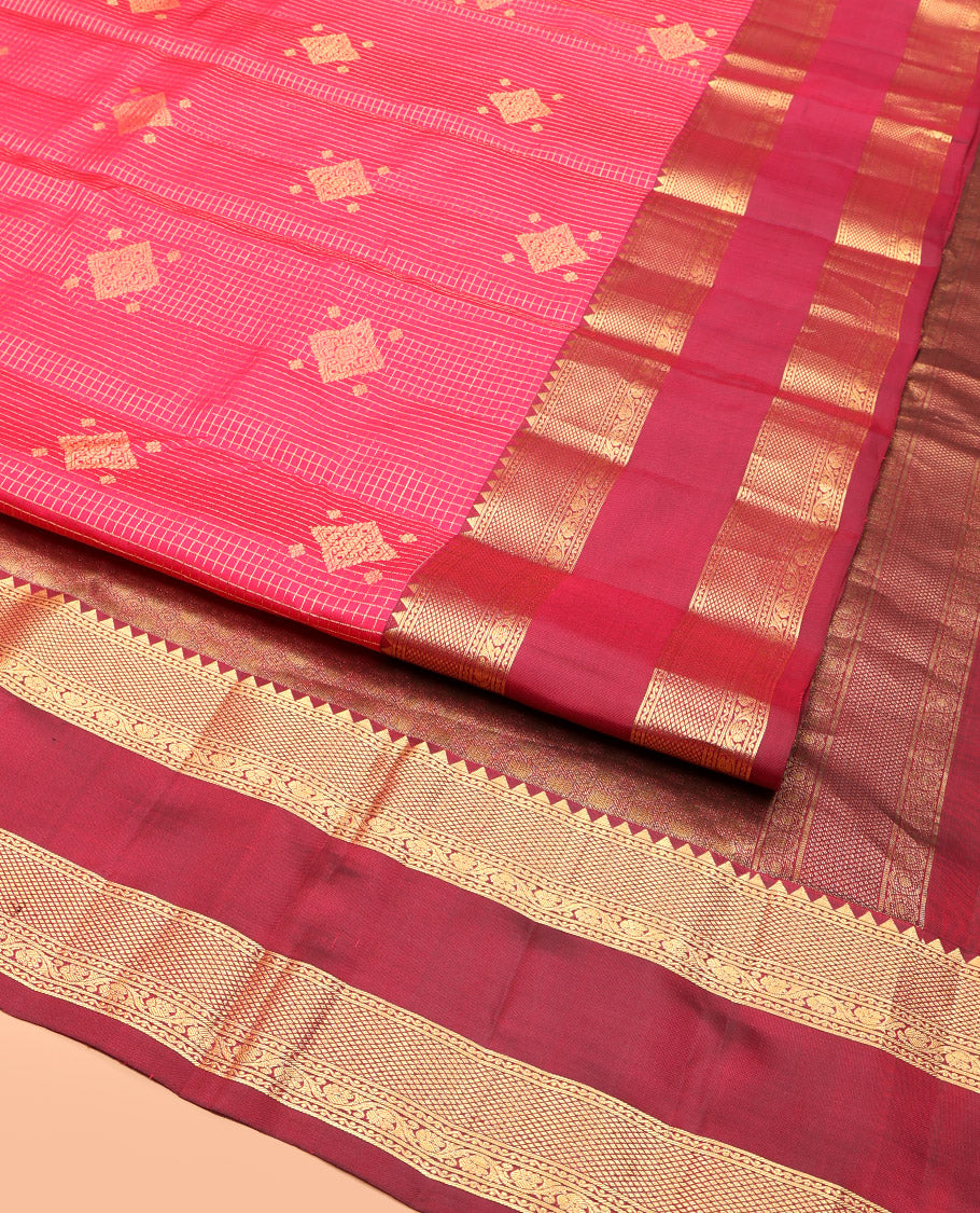 Pink Vasundhara Silk Saree, Gracefully Embellished with Zari Buttas and Checks, a Contrast Rettai Pettu Border of Rekku, Neli, Kodi Visiry, and Mayil Kann, Grand Pallu, and a Contrast Blouse