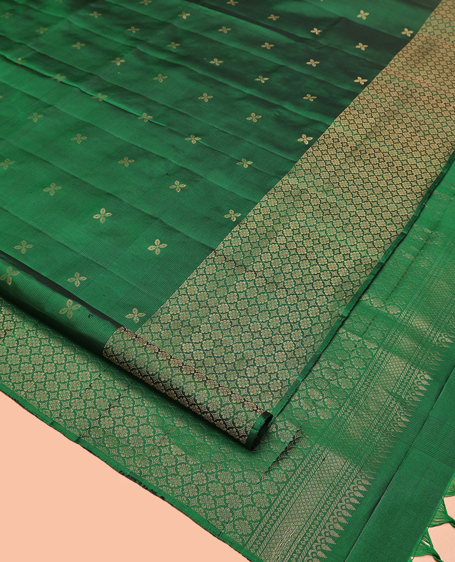 Green Mayuri Soft Silk Saree, Embellished with Zari Buttas All Over Its Body, Highlighted by Zari Border of Kamalam Designs, Pallu of Intricate Designs, and Paired with a Matching Blouse
